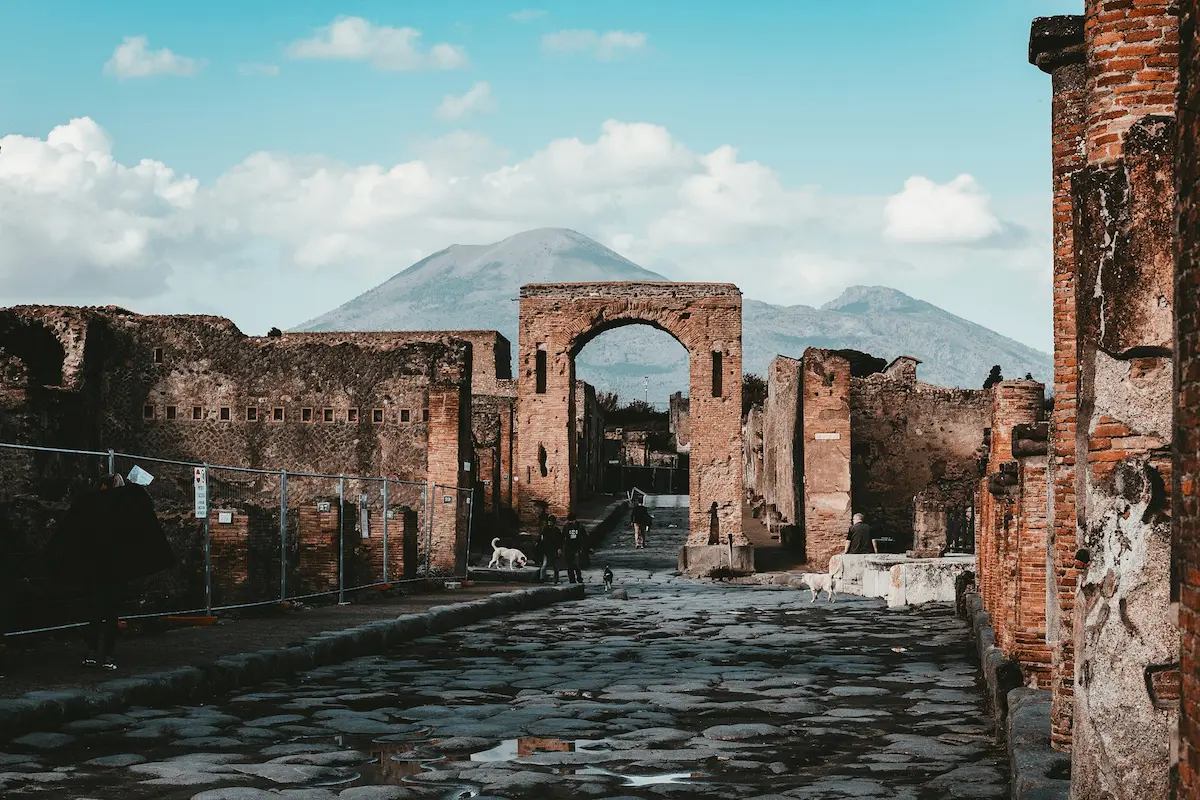 Ancient ruins of Pompeii with Mount Vesuvius in the background