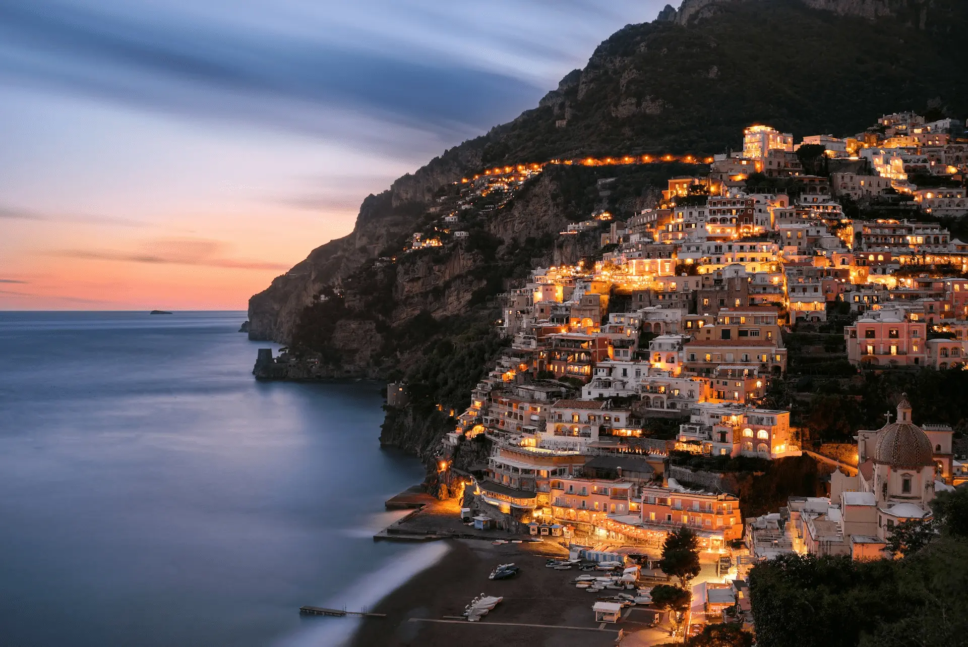 Amalfi Coast coastal road view with Positano in the distance