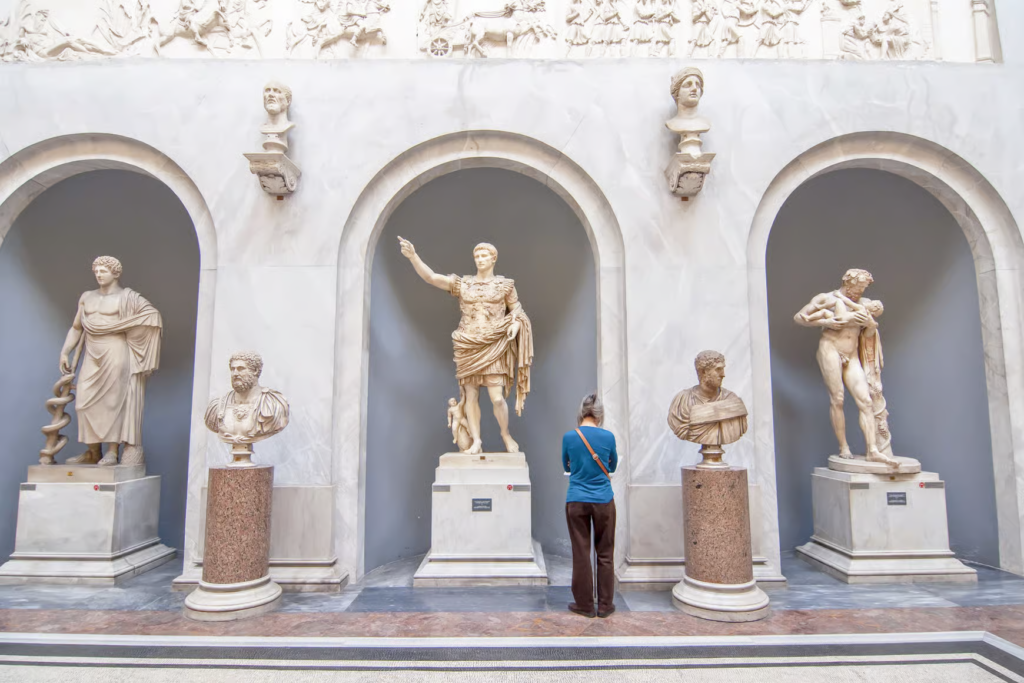Tourist admiring exhibits in Vatican Museums - ticket only tour
