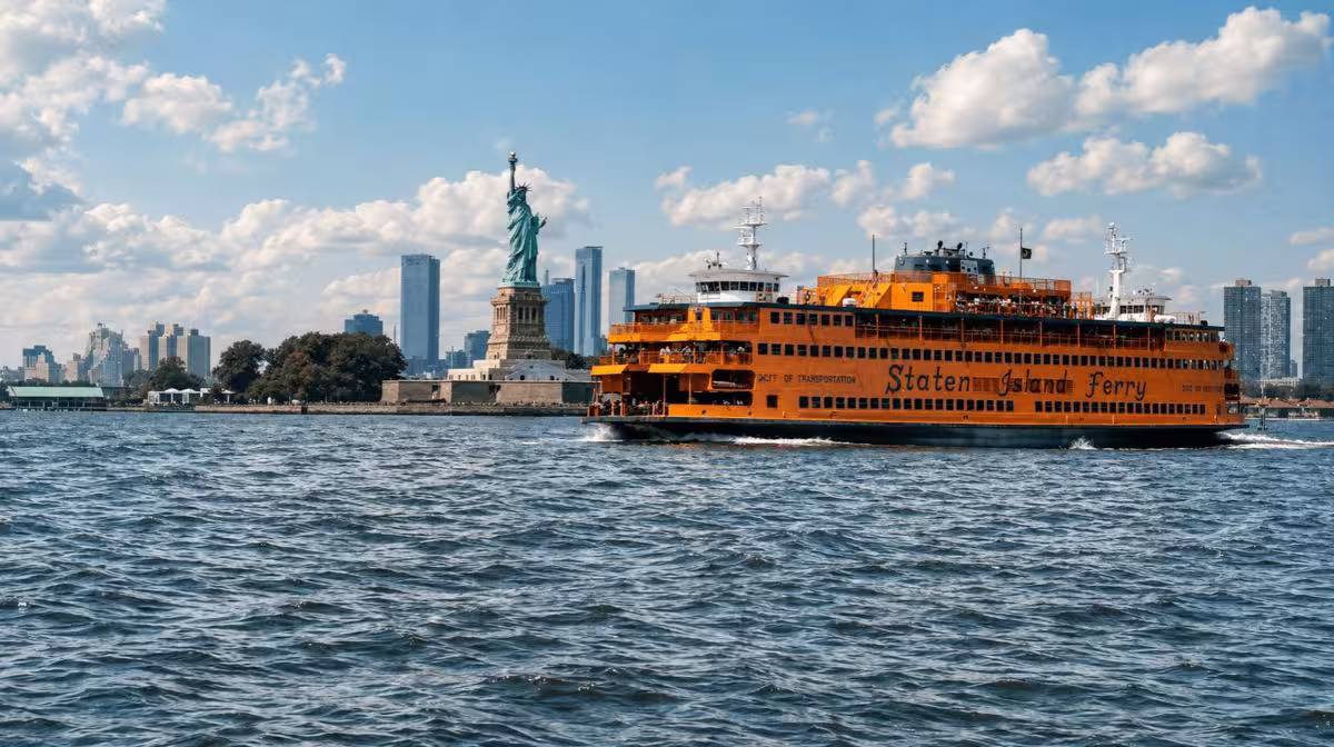 The Staten Island Ferry with the Statue of Liberty in the background