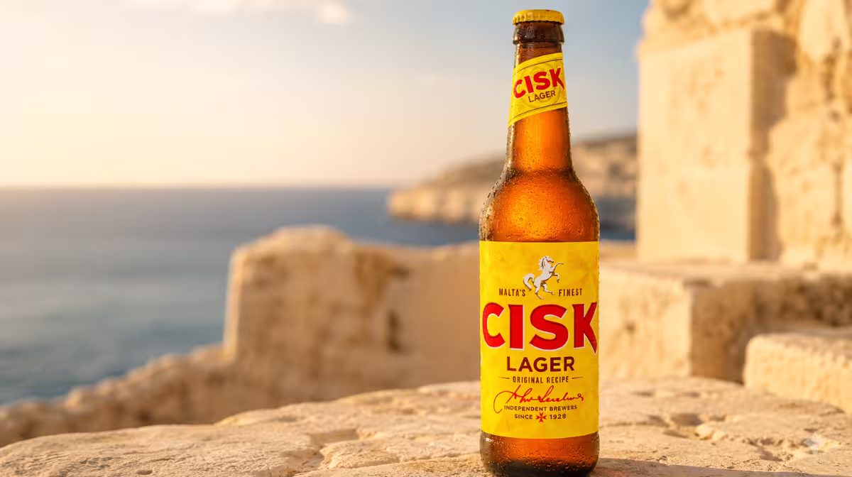 Cisk Lager bottle and poured glass