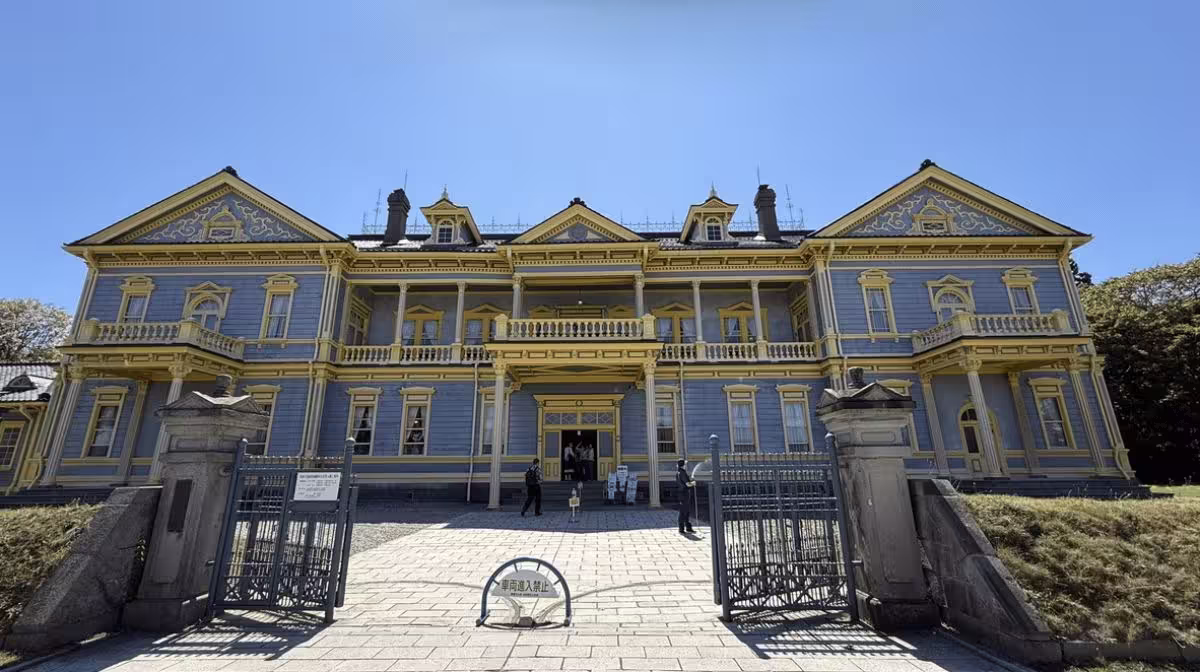 The mustard-yellow Former Public Hall of Hakodate Ward in Motomachi