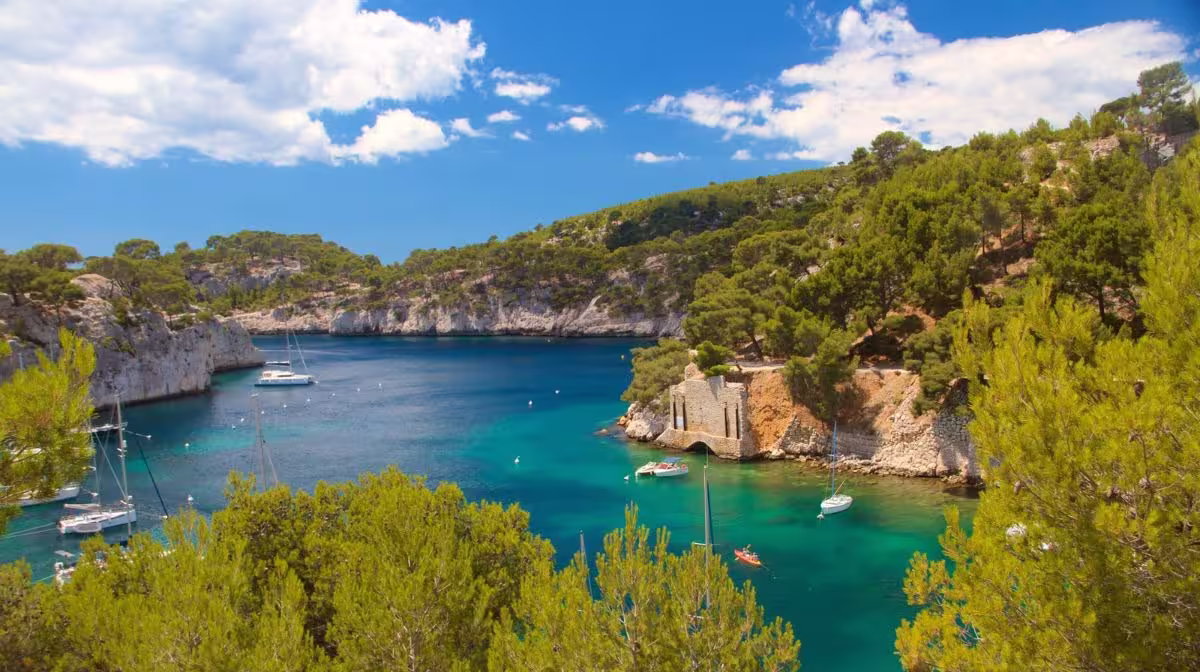 Turquoise water and white limestone cliffs in the Calanques National Park near Marseille